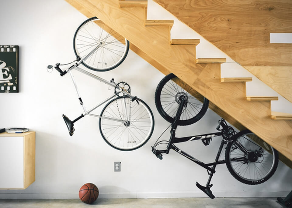 Bike stored under the stairs.